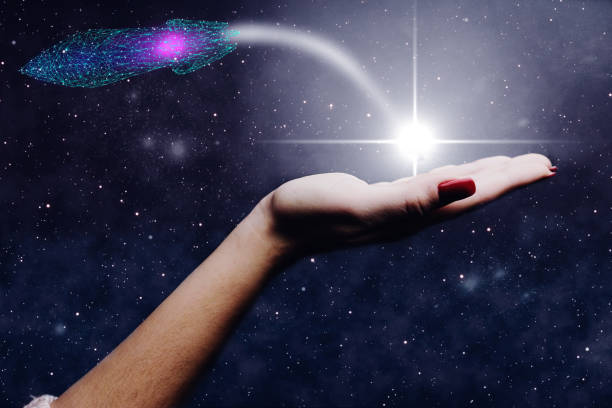 istock Human hand holding spaceship low poly. Nebula dust. Mixed media. 1096779108