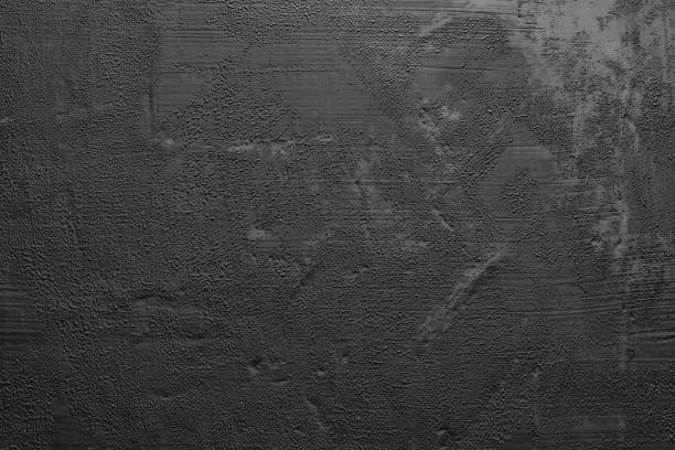 istock texture black paint smeared on the wall. Dark background, substrate for work. 1096788390