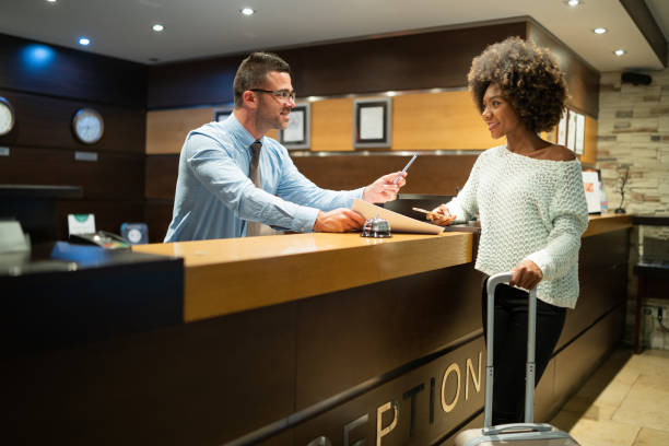 istock Woman register on hotel's reception 1096794378