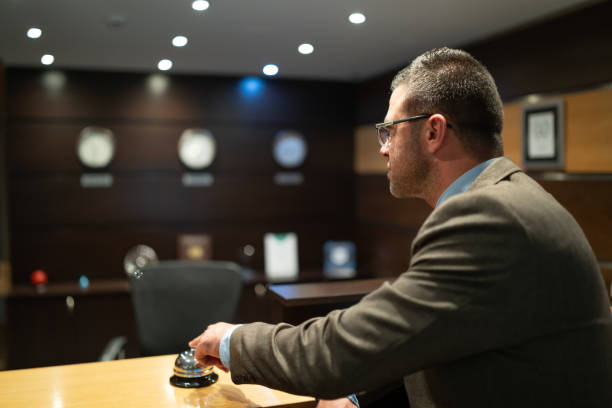 istock Bored businessman waiting on hotel's reception 1096794676