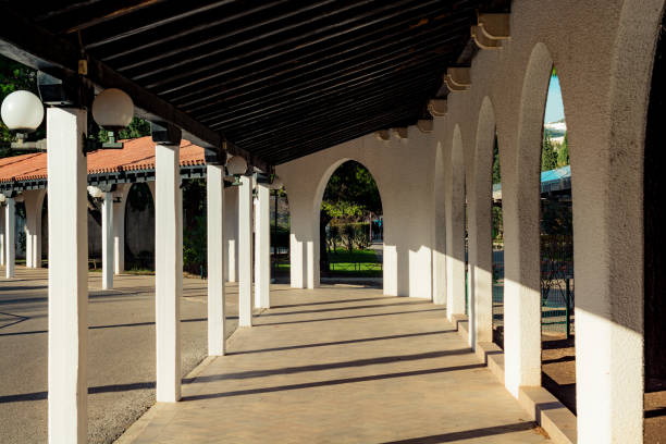 istock Walking path with a roof on sunny day 1096796518