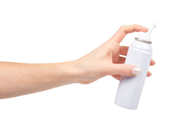 istock White nose wash spray bottle with hand, sea water therapy 1096796536