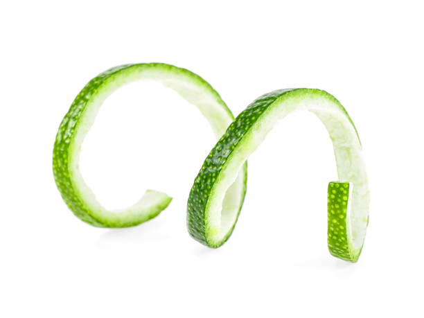 istock Peel of fresh ripe lime on white background 1096796756