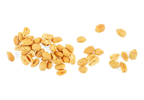 istock Roasted salted peanuts isolated on a white background, top view. 1096796772