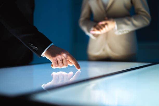 The woman and a man working with a sensor screen