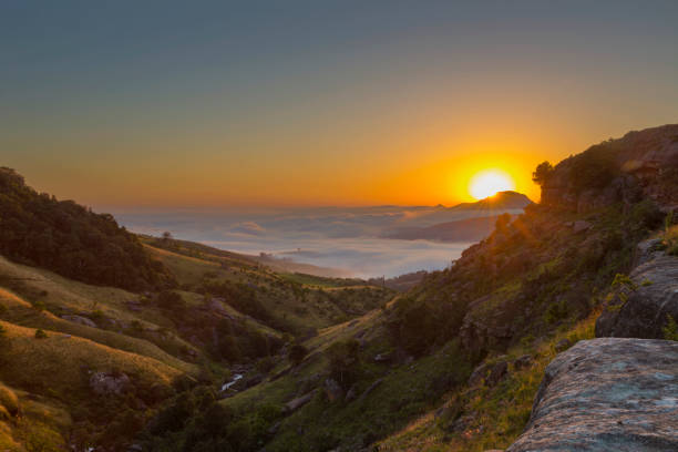 istock Sunrise above the mist in the valley below 1096810358
