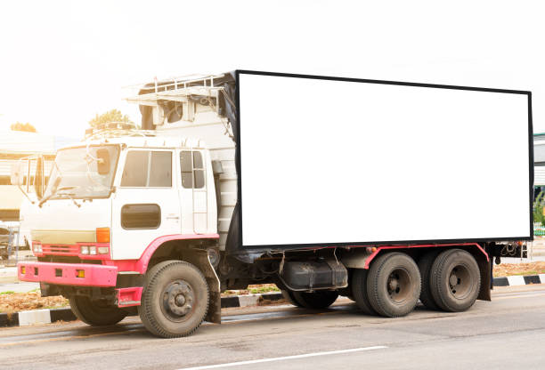 istock container trucks Logistic by Cargo truck on the road .empty white billboard .Blank space for text and images 1096818790
