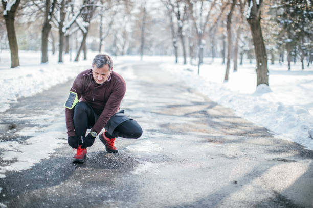 istock Senior man tying shoelace 1096825234