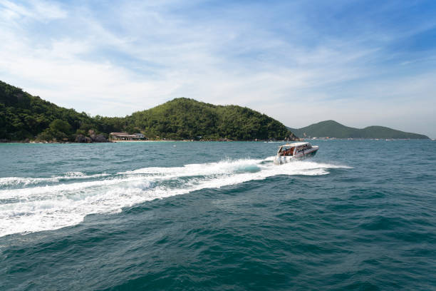 istock The boat and the island. 1096826122
