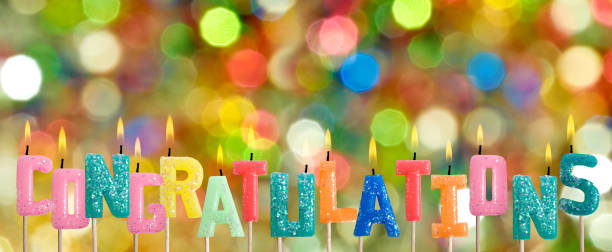 istock festive, congratulatory candles on a blurred background 1096827070