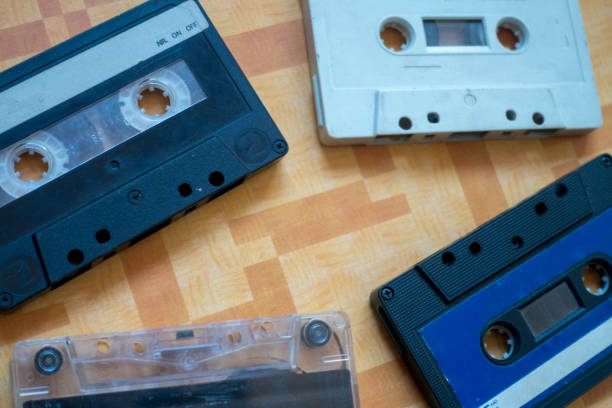 istock Old cassette tapes on an orange table 1096828982