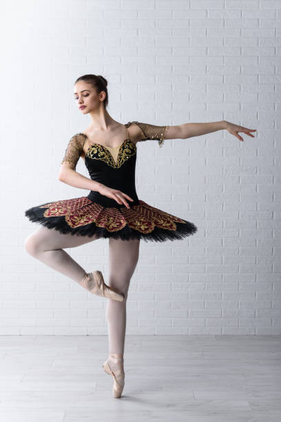 istock Beautiful ballerina dancing at ballet dance studio 1096829010