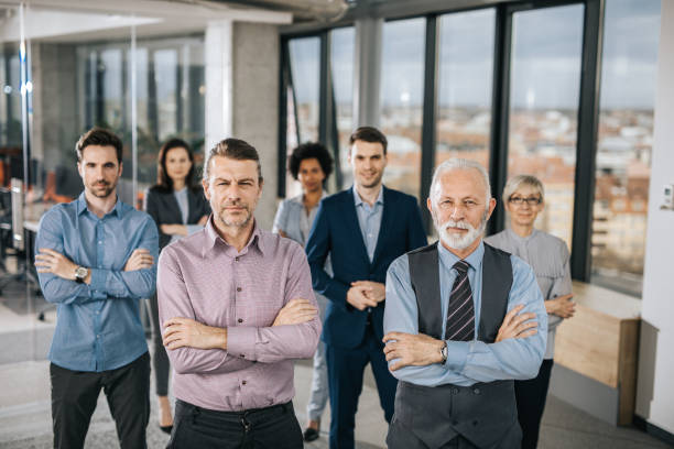 istock Confident business team standing in a hallway with crossed arms. 1096830682