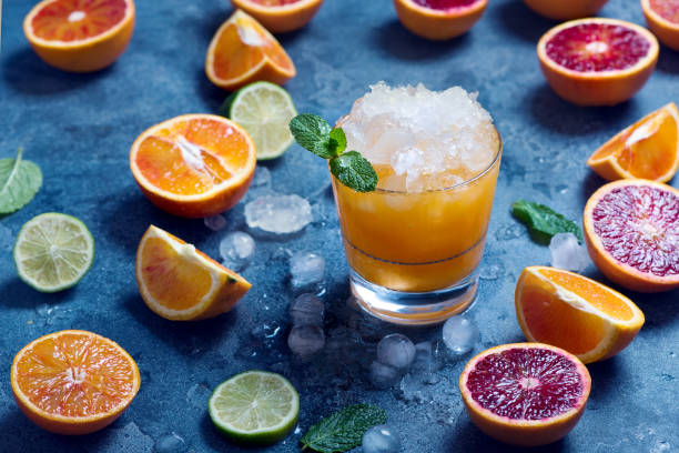 istock Citrus cocktail with crashed ice, juicy summer drink with oranges, citrus juice 1096836584