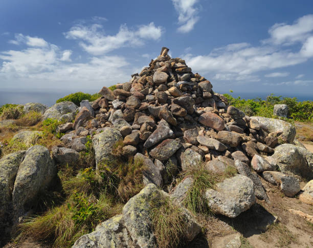 View of the stone pyramid. Lizard Island. The Great Barrier Reef, Queensland, Australia. Stitched Panorama. View of the stone pyramid, located at the top of the observation deck of Lizard Island. Great Barrier Reef, Queensland, Australia. lizard island stock pictures, royalty-free photos & images