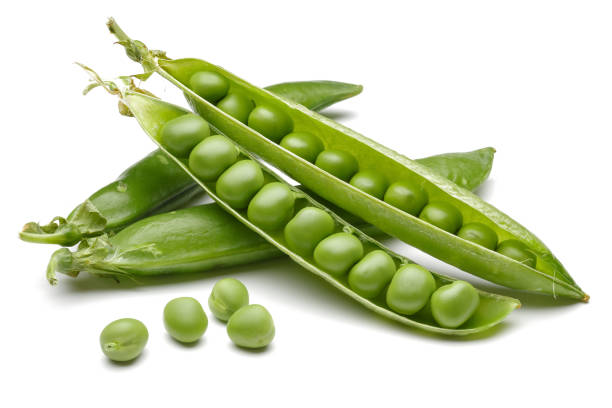 istock Fresh green peas on white background 1096839212