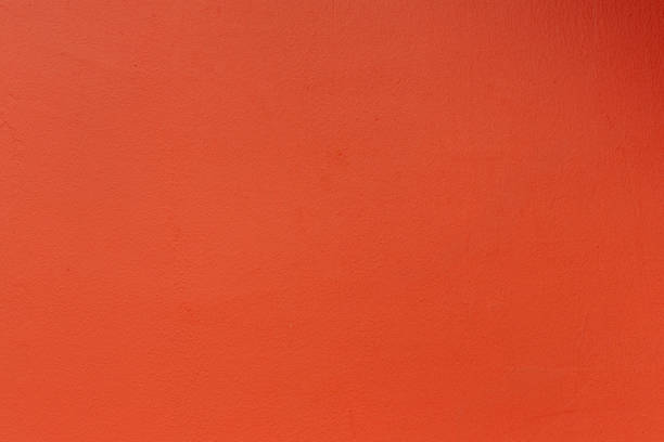istock vivid orange wall texture background, image vintage style for background, wallpaper, copy space and backdrop. 1096843796