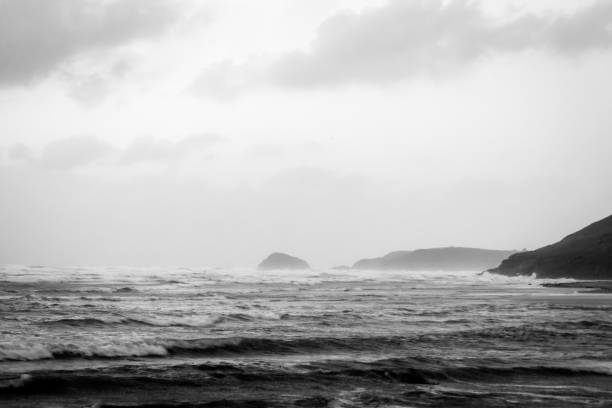 istock Cornish Stormy Beach And Coastline Black and White 1096849122