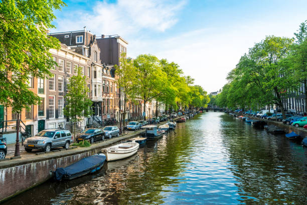istock Typical Dutch Houses and Houseboat 1096853218