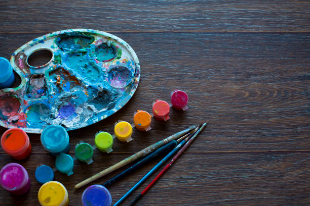 istock Art set, palette, paint, brushes on wooden background. 1096860066