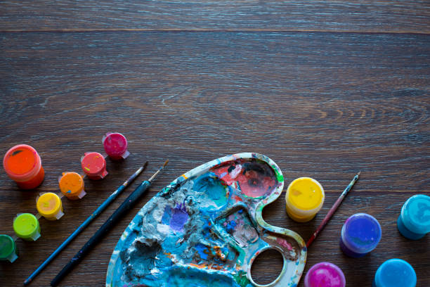 istock Art set, palette, paint, brushes on wooden background. 1096860106