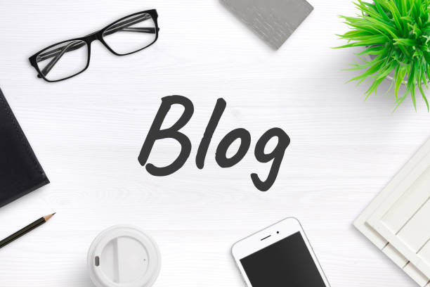istock Blogging concept composition with text in the middle. Office, writing supplies beside. Top view, flat lay. 1096860208