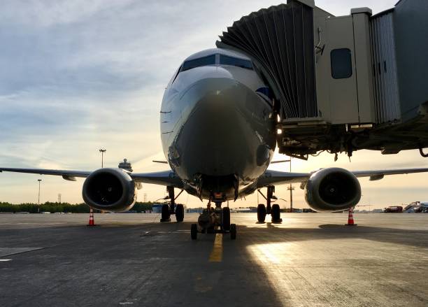 istock White and grey airplane on the parking lot 1096866608