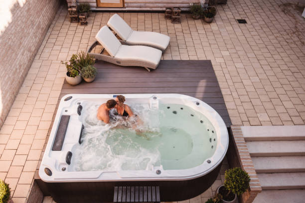 istock Couple in hot tub pool spa whirlpool 1096869444