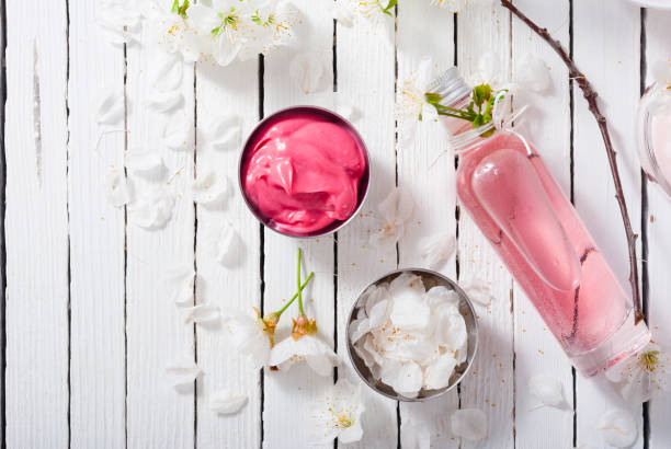 istock Cherry flower cosmetic cream white wooden 1096874512