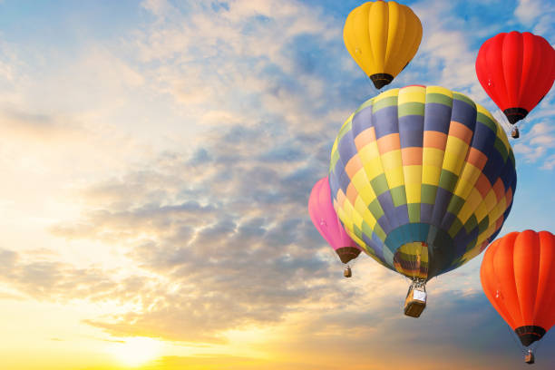 istock Colorful balloons floating in the sky at sunset. 1096874842
