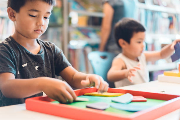 istock Kids love playing with blocks. 1096875928
