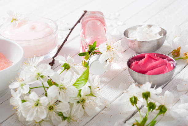 istock Cherry flower cosmetic cream white wooden 1096877990