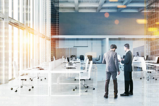 istock Loft white office with meeting room, people 1096878014