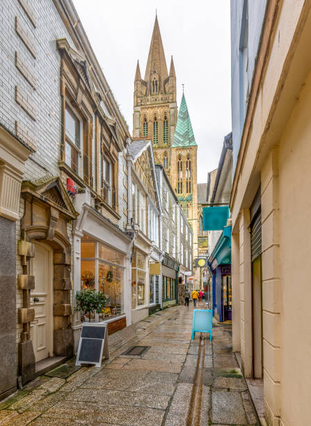 Shops in Cathedral Lane, Truro in Cornwall, with views of the Cathedral spires