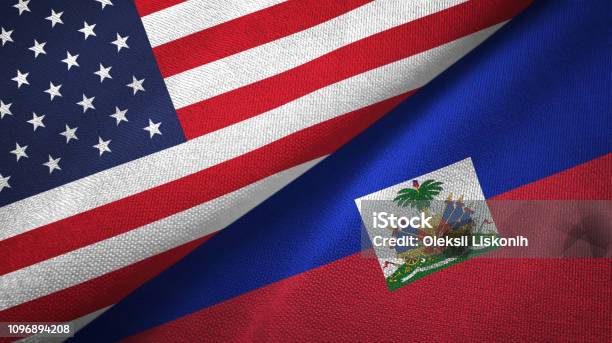 Haiti And United States Two Flags Together Textile Cloth Fabric Texture Stock Photo - Download Image Now