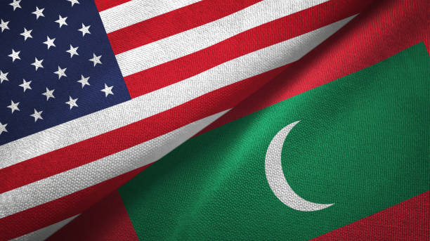 istock Maldives and United States two flags together textile cloth, fabric texture 1096894384