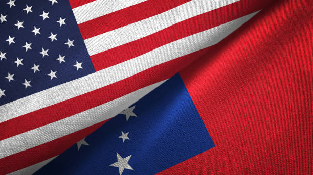 istock Samoa and United States two flags together textile cloth, fabric texture 1096895684