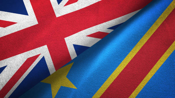 istock Congo Democratic Republic and United Kingdom two flags together textile cloth, fabric texture 1096904418