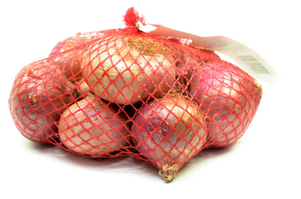 istock Pack of red onions isolated 1096905680
