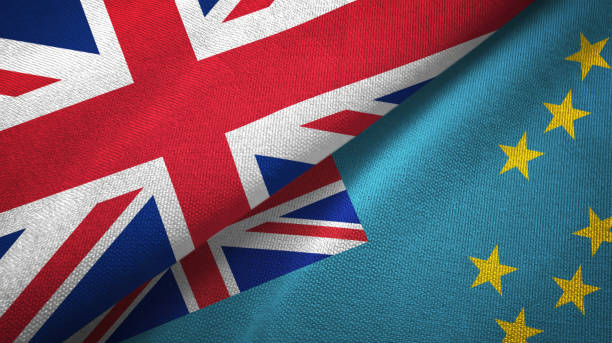 istock Tuvalu and United Kingdom two flags together textile cloth, fabric texture 1096905732