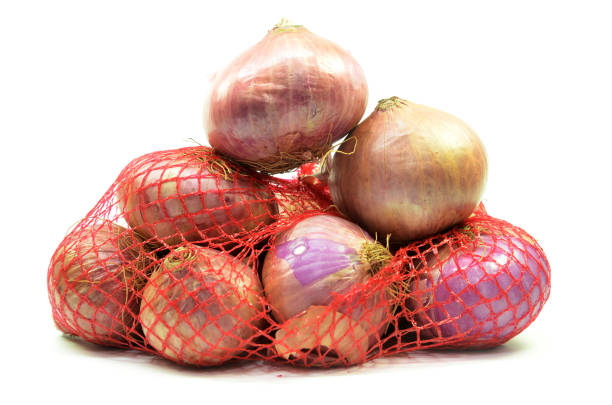 istock Pack of red onions isolated 1096906776