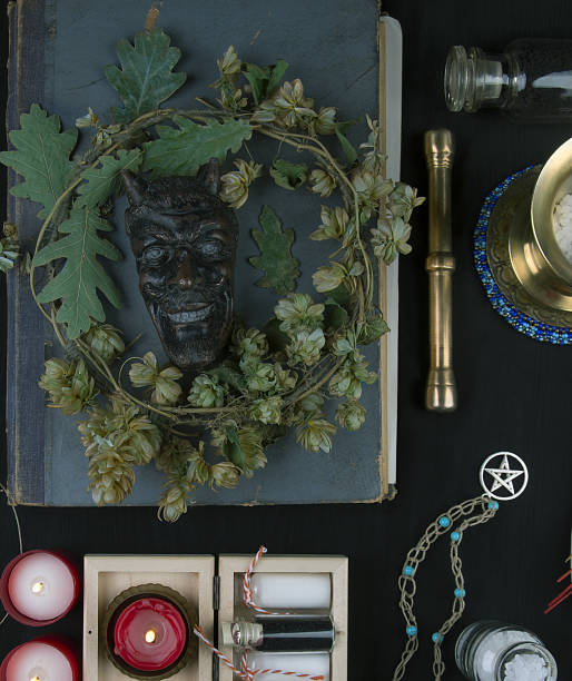 istock Occult altar with Pan's face, wreath of hops 1096910524