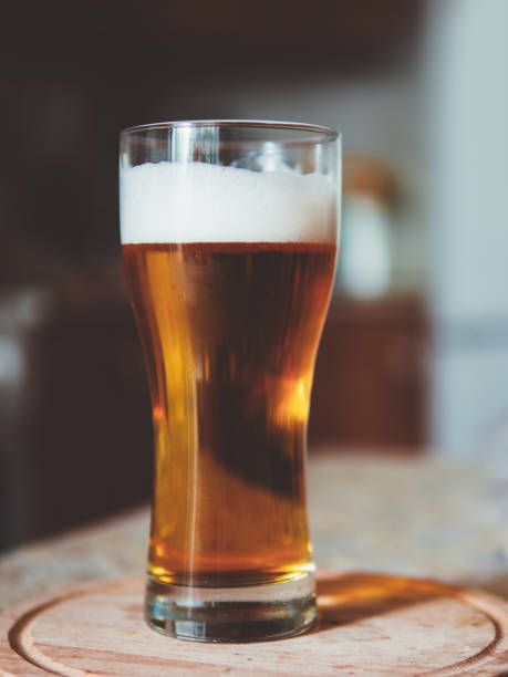 istock Glass of cold light beer on the kitchen table 1096915656