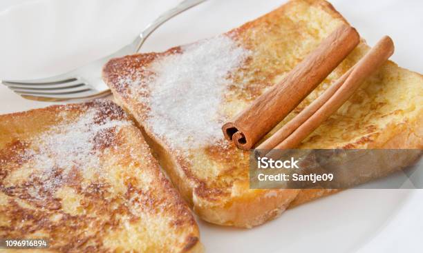 French Toast And Cinnamon Stock Photo - Download Image Now - Cinnamon, French Toast, Baked