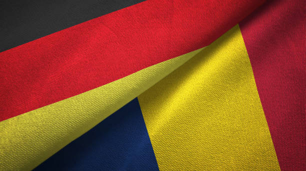 istock Chad and Germany two flags together textile cloth, fabric texture 1096918730