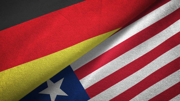 istock Liberia and Germany two flags together textile cloth, fabric texture 1096918994