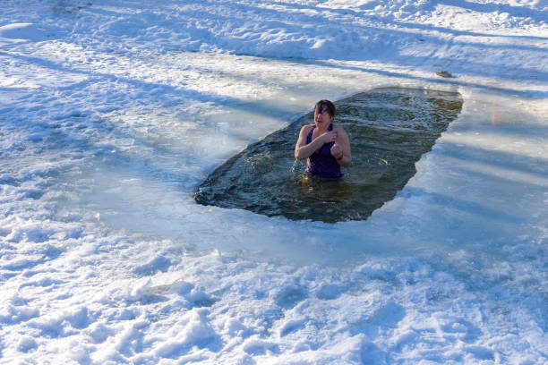istock A woman crosses after dipping into ice water. 1096920360