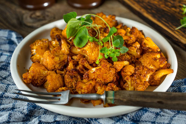 istock Cauliflower rosettes in a herbal marinade. 1096926362