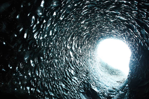 istock Black ice moulin at icelandic glacier 1096926702