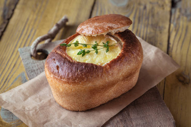 istock Camembert bread bowl on the wooden background 1096926720